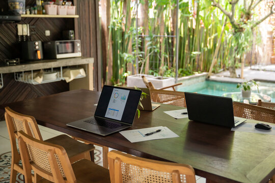 Laptops And Documents On The Desk 