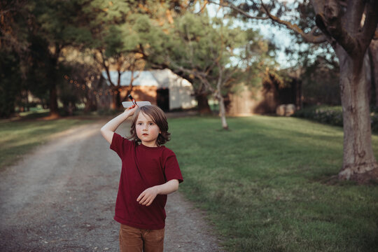 Child flying toy plane