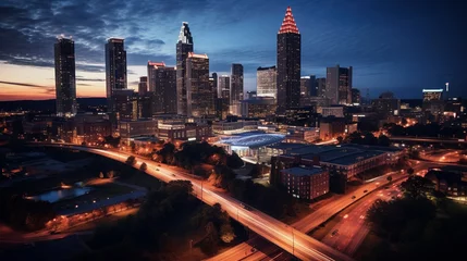 Tuinposter Drone photo of Atlanta Georgia city at night long exposure for traffic blur taken with DJI mini 3 pro © @foxfotoco