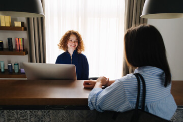 Woman on Reception in Beauty Salon