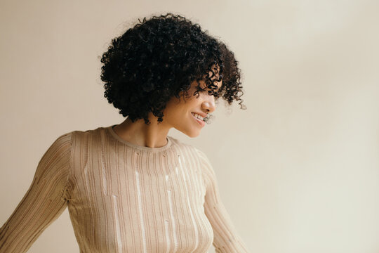Cheerful Woman With Curly Hair