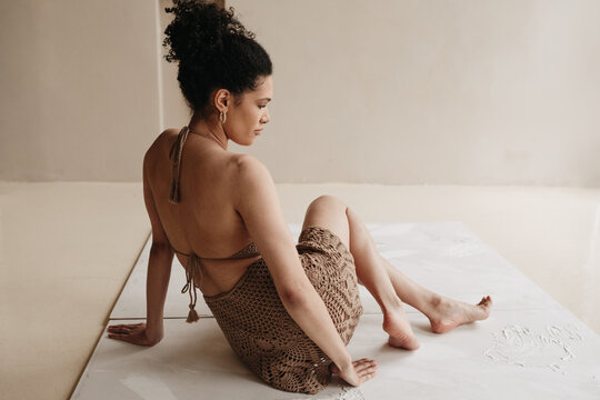 Studio portrait in beige color 