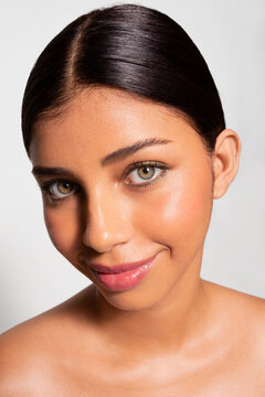 Young Woman With Her Hair Up Smiling
