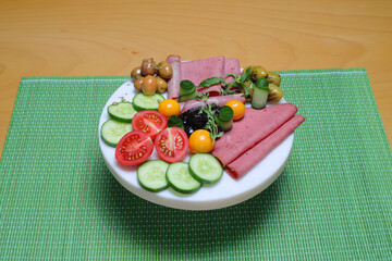 Turkish breakfast plate full of tasty food on wooden table