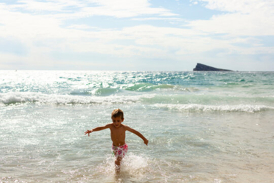 Child bathing in the sea