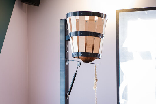 Naismith peach basket. History on basketball. Old wooden basketball basket. James Naismith invented basketball.