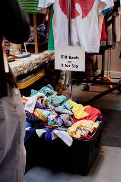 Box with t-shirts at the vintage market