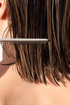 Wet hair and comb 