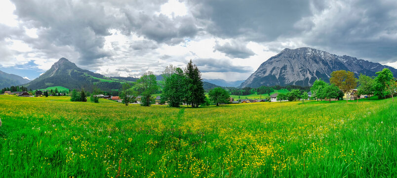 Summer austrian landscape with Grimming mountain (2.351 m), an isolated peak in the Dachstein Mountains, view from small alpine village Tauplitz, Styria, Austria