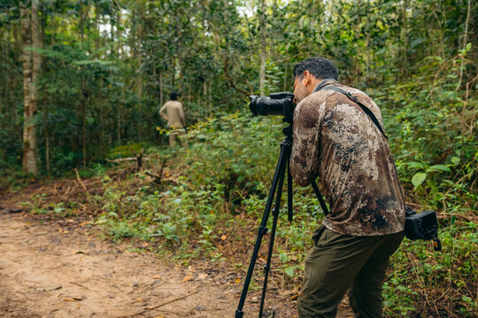 Photographers birding in nature