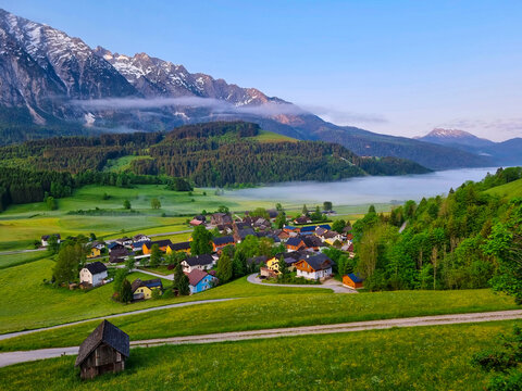 Summer austrian landscape with Grimming mountain (2.351 m), an isolated peak in the Dachstein Mountains, view from small alpine village Tauplitz, Styria, Austria