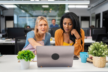 Young professionals collaborate in a modern office.