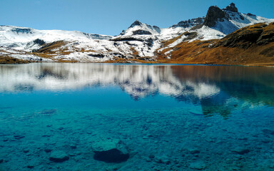 Ice Lake with Mountain Reflections | San Juan National Forest, Colorado, USA
