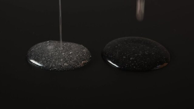 Guar gum vs Xanthan gum. Comparison of fluidity, solubility in cold water and other properties. Natural thickeners Xanthan and Guar gum dissolved in water. Food additives with numbers E412 and E415.