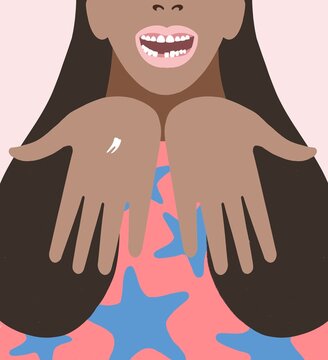 Young kid girl proudly holds loose tooth in her hand. Dental milestone