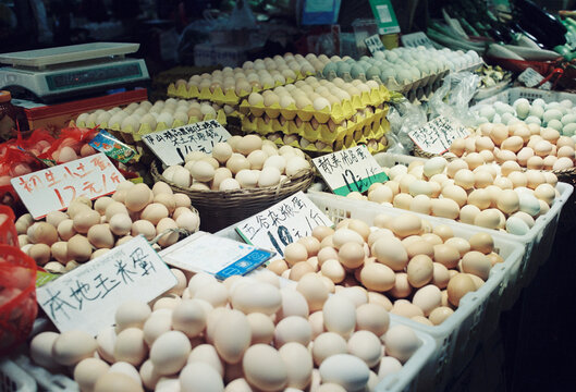 A shop selling various eggs at a vegetable market
