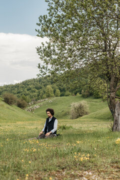 man praying salah in nature