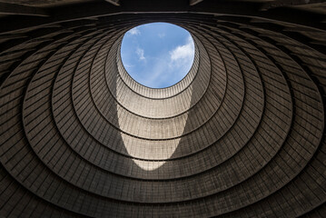 View from inside of top cooling tower hole of an abandoned power plant