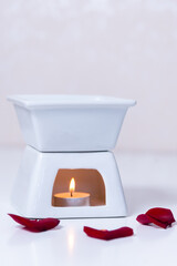 candle with flowers in spa