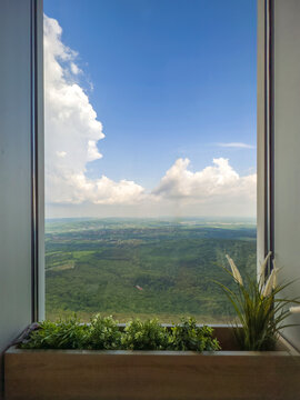 Fototapeta window view of nature and blue sky