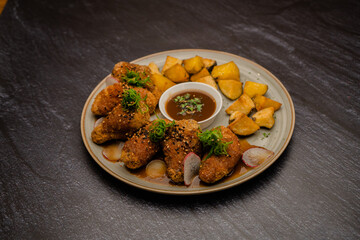 BBQ WINGS ON WOOD TABLE