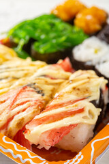 angle view fresh sushi close up at vertical composition