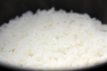 boiled white rice. ready-to-eat white rice. white rice with selective focus.