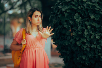 
Funny Woman Saying Stop Setting Personal Boundaries
Girlfriend making halt gesture with her palm...