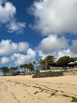 Beautiful bali beach in sunny day with cloudy sky