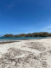 Fototapeta na wymiar Beautiful seascape with white sands and turquoise water in Lombok