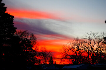 Fototapeta na wymiar Fiery Sunset Clouds in Winter, Ohio