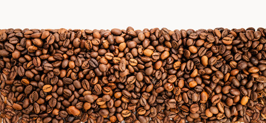 Roasted coffee beans isolated on white background, Roasted coffee beans on white With work path.