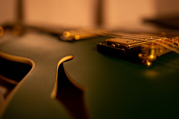 Beautiful green jazz guitar closeup