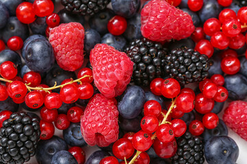 Different fresh berries as background, closeup