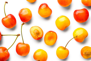Many sweet yellow cherries on white background