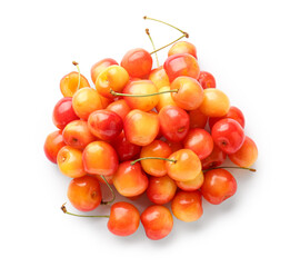 Heap of sweet yellow cherries on white background
