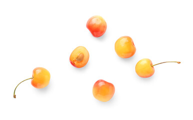 Sweet yellow cherries on white background