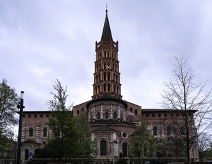 Fototapeta na wymiar Architectural detail of the Basilica of Saint-Sernin, a church in Toulouse, France, and former abbey church of the Abbey of Saint-Sernin or St Saturnin