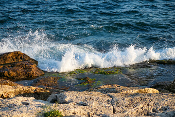 waves crashing on rocks