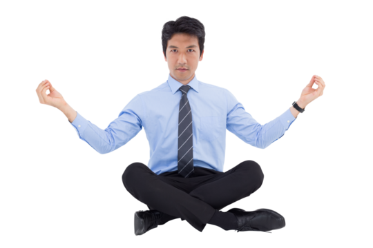 Digital png photo of focused asian businessman practising yoga on transparent background