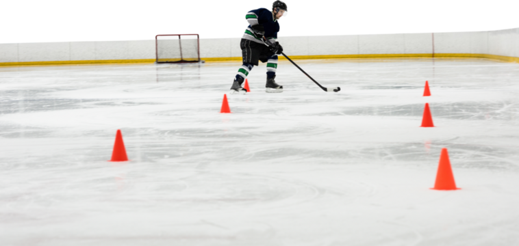 Digital png photo of caucasian male hockey player training at ice rink on transparent background - Powered by Adobe