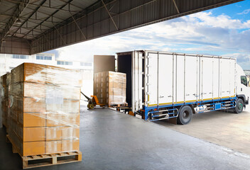 Container Trucks Parked Loading Package Boxes Pallets at Warehouse Dock. Supply Chain, Distribution...