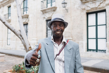 Portrait of Black Man musician on the street in La Havana in Latin America, Afro american and caribbean people