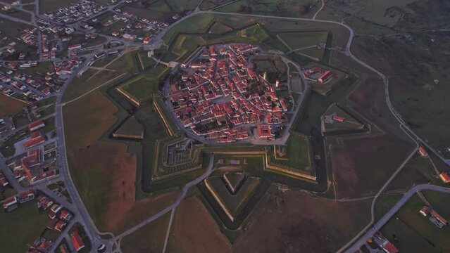 Top down view of medieval fortress Almeida Portugal during sunrise, aerial