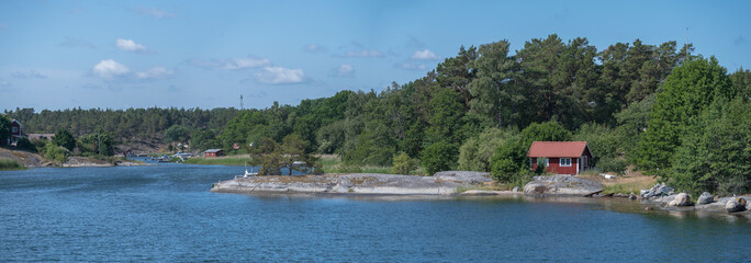 Island, skerries and islet, in the middle part of the archipelago. Small summer house on a cliff, a...