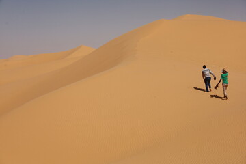 Fototapeta na wymiar Sand dunes at the Sahara desert, Algeria 