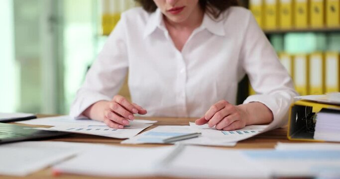 Business worker in rage beats fists on table in office. Emotions of aggression and stress at work