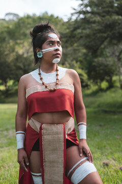 Mayan characterized woman with red dress