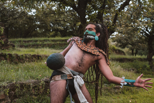 Mayan warrior hitting a rubber ball with his hip
