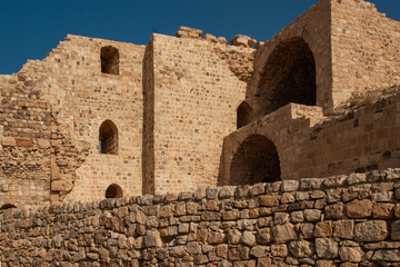 Jordan. Crusader castle El-Karak.Iinterior buildings in front of fortress wall. Majestic and impregnable fortress of El-Karak or "Fortress of Crow" was built by crusaders on mountain in 1162.